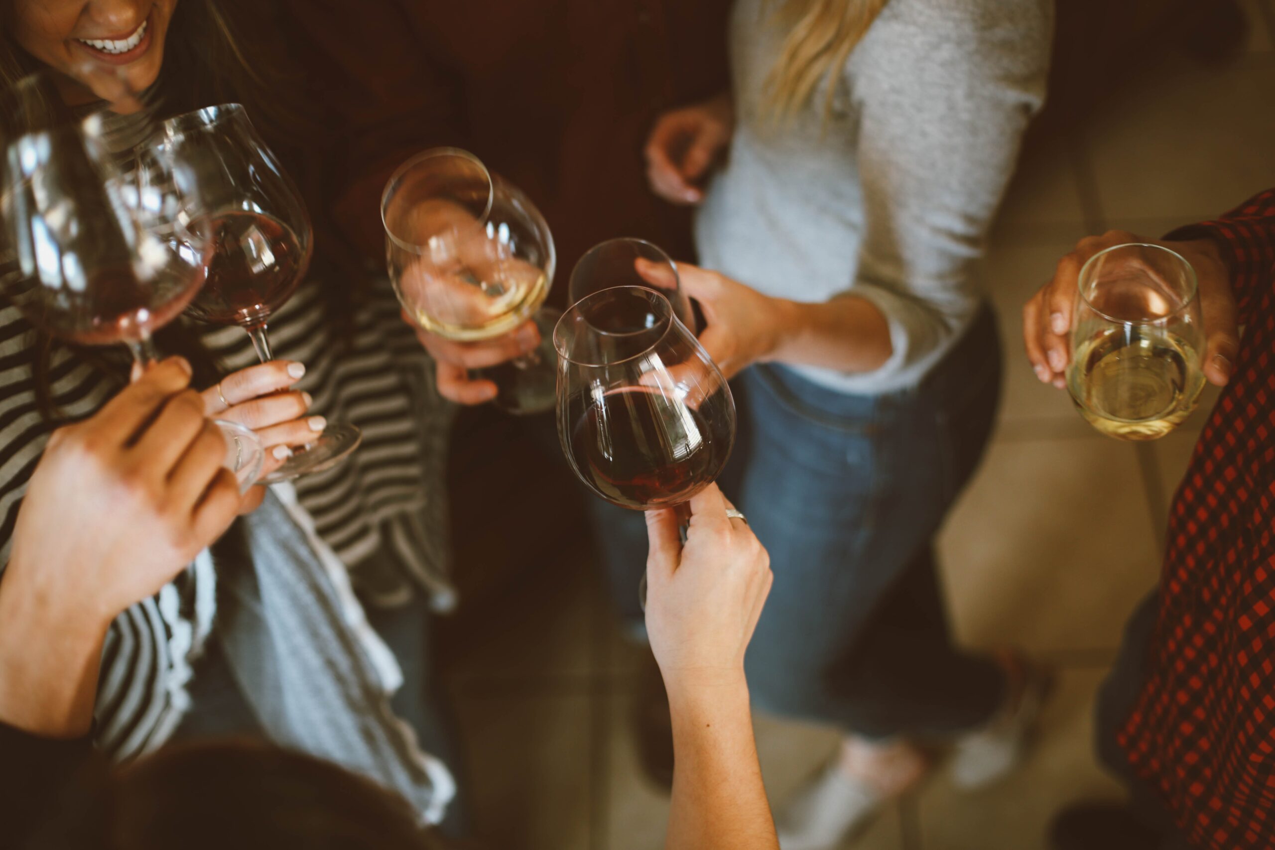 A group of friends with wine glasses