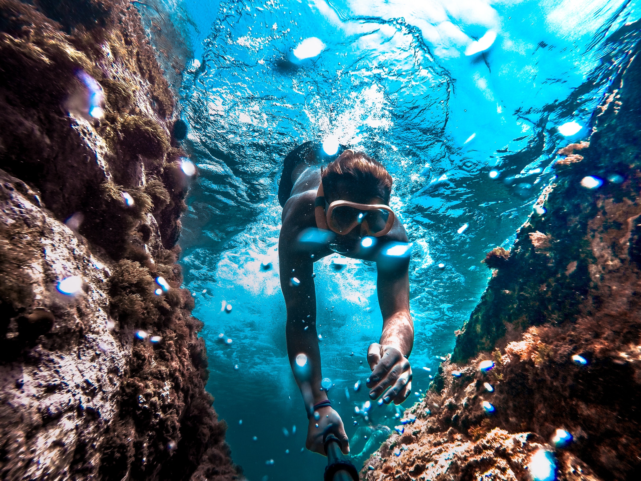 a woman diving in Falmouth Bay