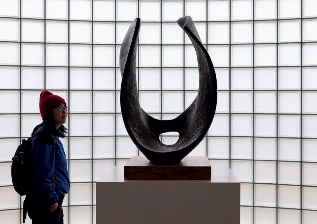 Someone looking at a sculpture in the Tate gallery