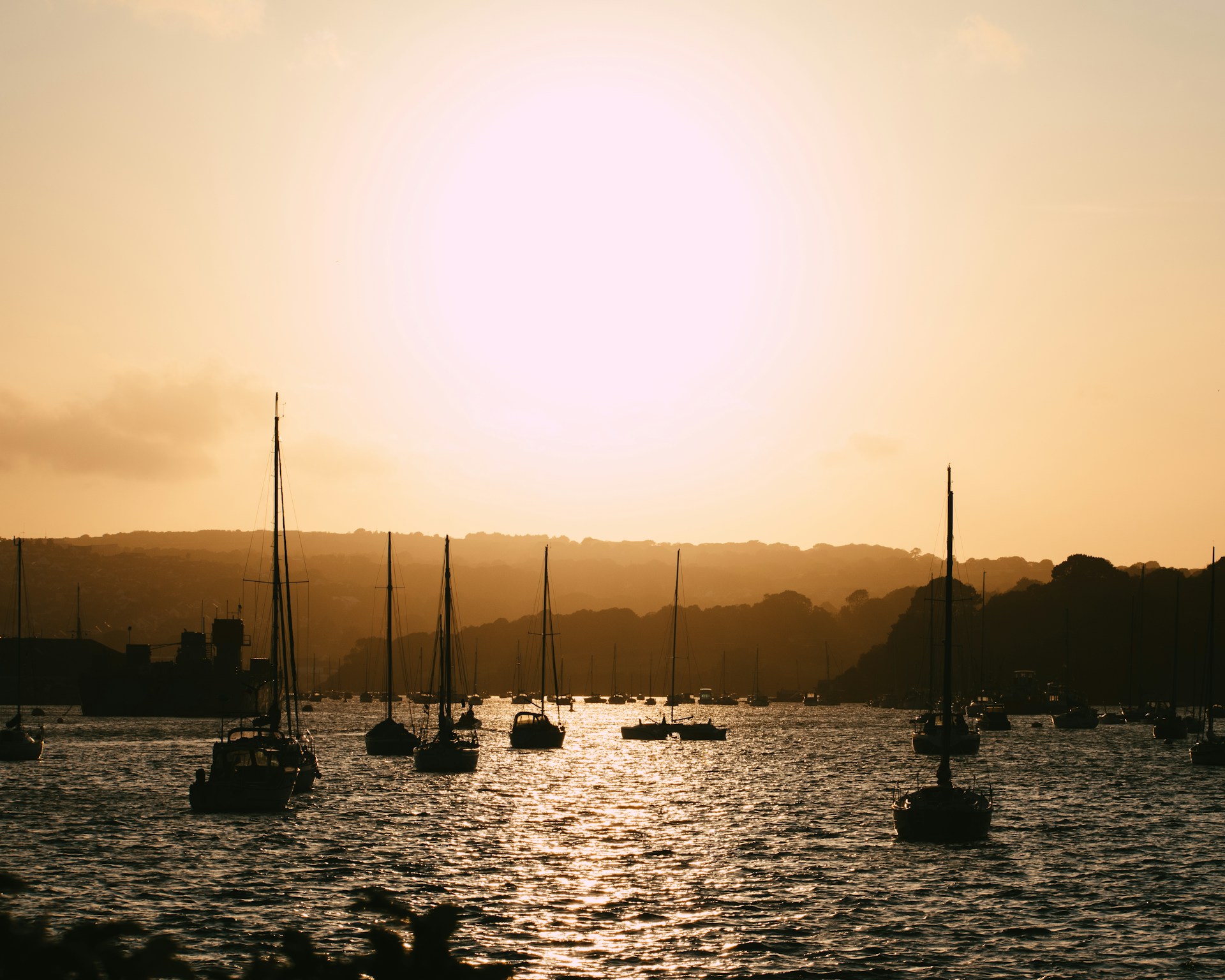 Boats on the water in Falmouth during a sunset