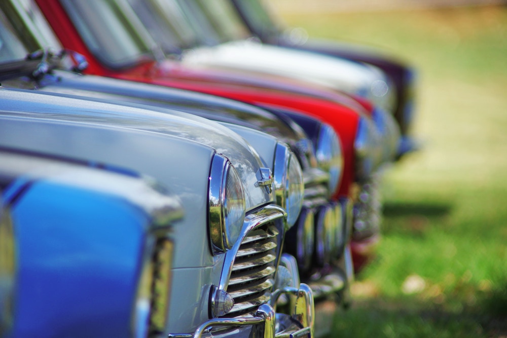 A row of old fashion Mini cars
