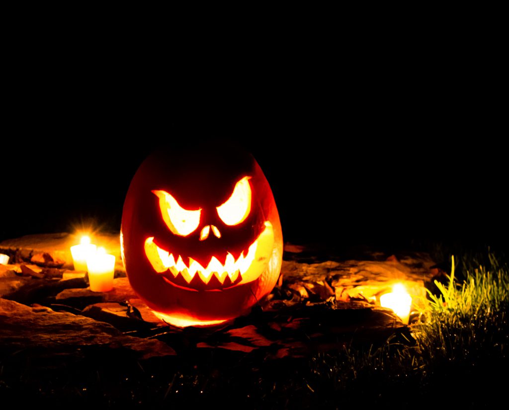 A lit and carved pumpkin