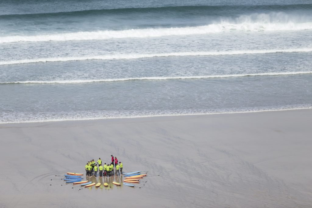Beginner surfers on Newquay beach